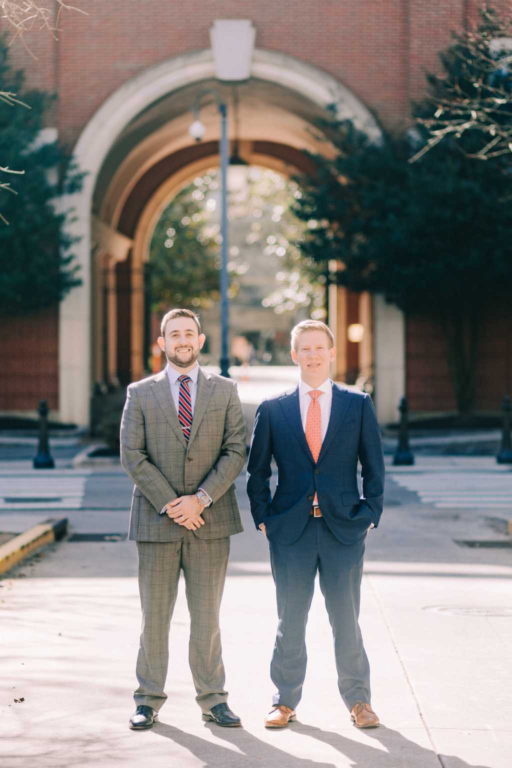 Attorney John Barnes and Attorney Brandon D. Fersten standing outside