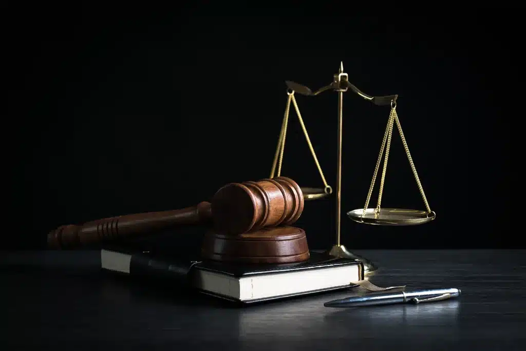 Judge's gavel, scales, and law book
