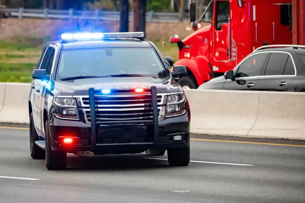 Police cruiser parked on highway