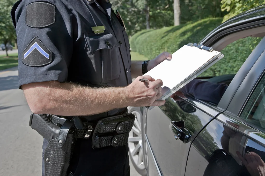 Police officer writing a ticket