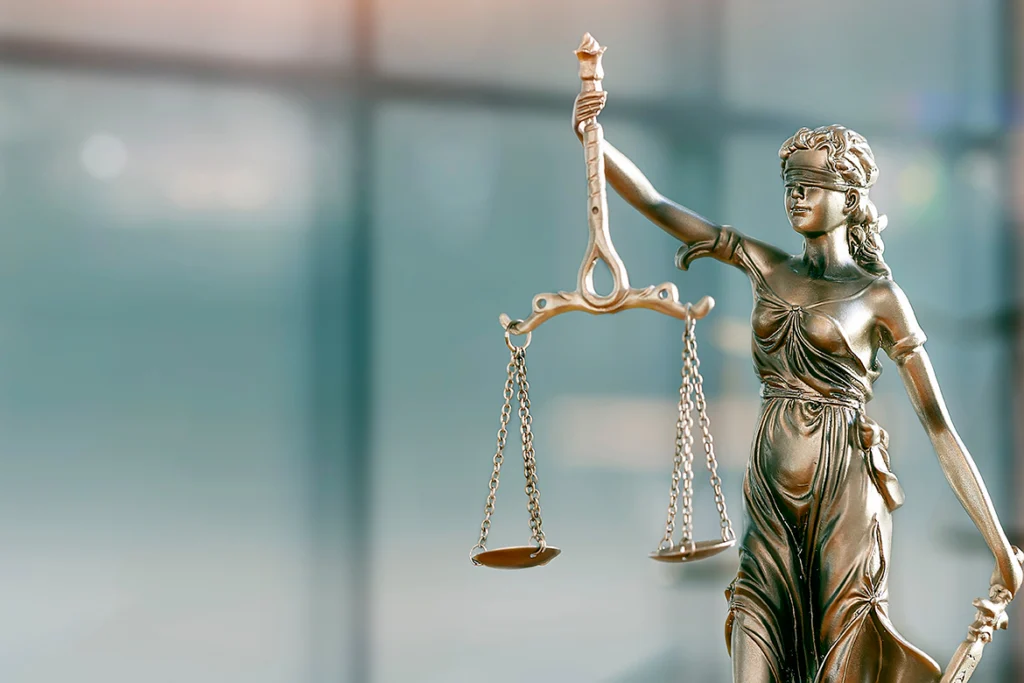 Lady of justice statue with scales